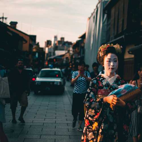 Encounter a geisha walking through Kyoto's historic district.
