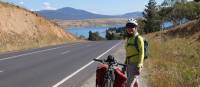 Cyclist on the Barry Way with view of Lake Jindabyne | Ross Baker