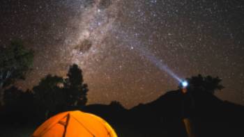 Dark Sky Park, Warrumbungle National Park,Destination NSW The night sky filled with bright stars over Australia's only Dark Sky Park in the Warrumbungles.