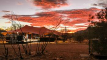 Sunset over our semi-permanent eco-camp on the Larapinta Trail