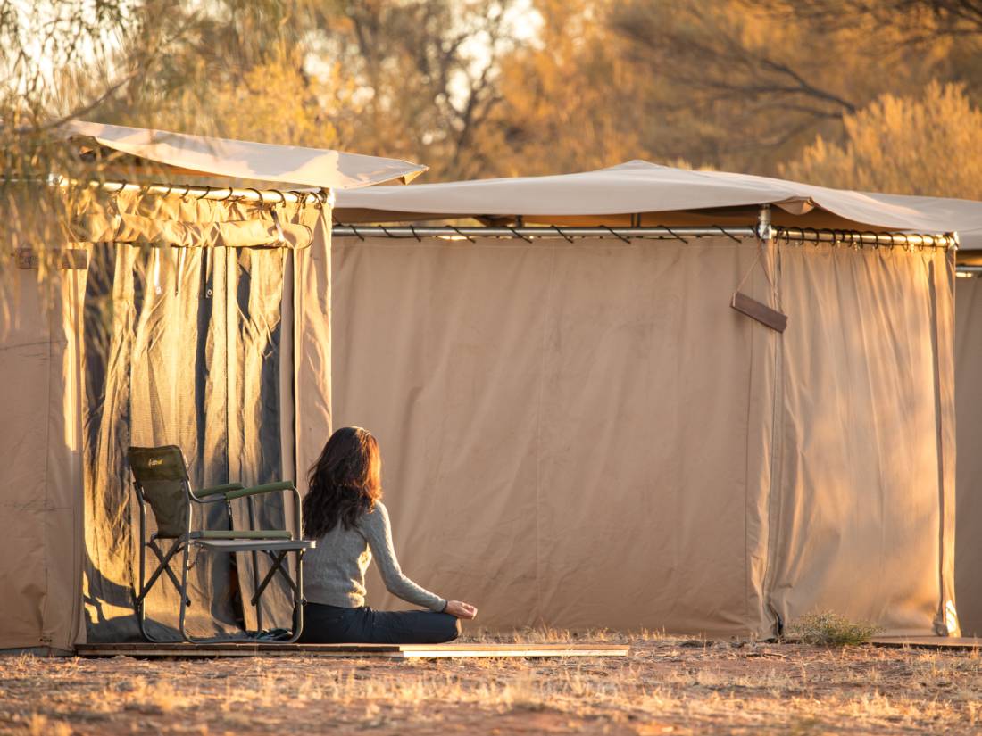 Relaxing in front of our spacious Larapinta In Comfort tents |  <i>#cathyfinchphotography</i>