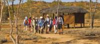 Trekkers embarking at the beginning of the Larapinta Trail, the old Telegraph Station | Peter Walton