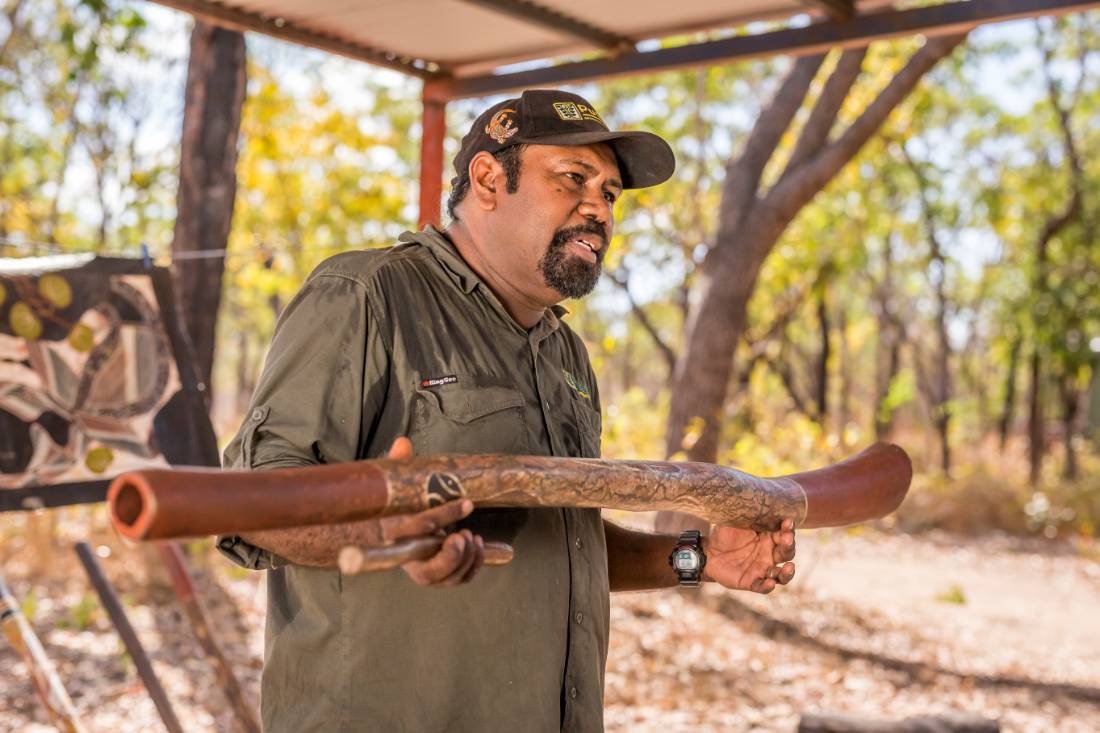 An Indigenous guide shares his knowledge of Aboriginal music during a cultural tour |  <i>Tourism NT/Nick Pincott</i>