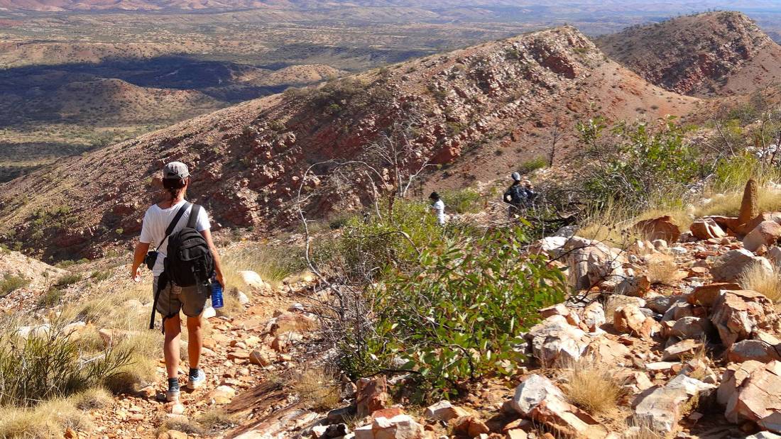 The Larapinta Trail descends from the high point on the ridgeline |  <i>Sue Badyari</i>