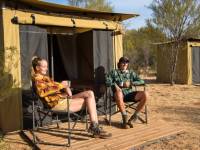 Trekkers relaxing on the porch of their campsites |  <i>Shaana McNaught</i>