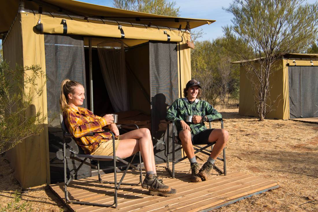 Trekkers relaxing on the porch of their campsites |  <i>Shaana McNaught</i>