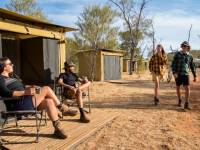 Trekkers relaxing on the porch of their campsites |  <i>Shaana McNaught</i>