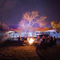 Around the campfire at one of our exclusive eco-comfort camps | Graham Michael Freeman