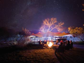 Around the campfire at one of our exclusive eco-comfort camps |  <i>Graham Michael Freeman</i>