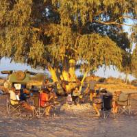Trekkers enjoying a rest at campsite near Finke River | Linda Murden