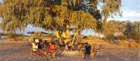 Trekkers enjoying a rest at campsite near Finke River | Linda Murden