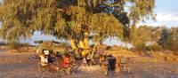 Trekkers enjoying a rest at campsite near Finke River | Linda Murden