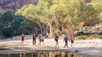 LukeTscharke-Larapinta-20220615-163544-_7R41687,Luke Tscharke Hiking beside one of the many waterholes along the Larapinta Trail