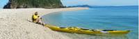 Kayak in crystal clear waters along the Cassowary Coast