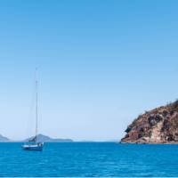 Clear blue skies passing Hook Island