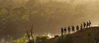 Trekkers look out at the view along the Murray River