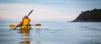 Kayakers enjoying the tranquility of Bruny Island, Tasmania
