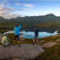 Hikers taking in the breathtaking views of Cradle Mountain and Lake St Clair | Peter Walton