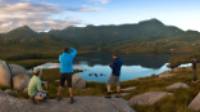 Hikers taking in the breathtaking views of Cradle Mountain and Lake St Clair |  <i>Peter Walton</i>