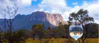 Enjoy a glass of wine after a day's trek along the Overland Track | Great Walks of Australia
