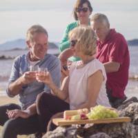 Enjoy a picnic beach lunch of fine Tasmanian wine and produce