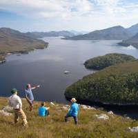 Guide and guests on Balmoral Hill, Port Davey