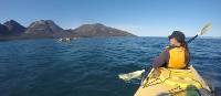 Kayaking on Coles Bay, with the Hazards in the distance | Brad Atwal