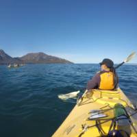 Kayaking on Coles Bay, with the Hazards in the distance | Brad Atwal