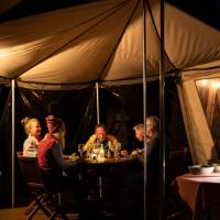 Enjoying dinner at our Eco-Comfort Camp on Flinders Island | Lachlan Gardiner