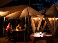 Enjoying dinner at our Eco-Comfort Camp on Flinders Island |  <i>Lachlan Gardiner</i>