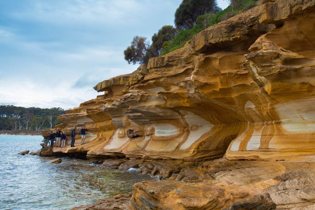 Stunning coloured rocks on the Maria Island walk |  <i>Tourism Tasmania and Rob Burnett</i>