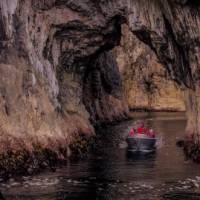 Travel through a network of sea caves