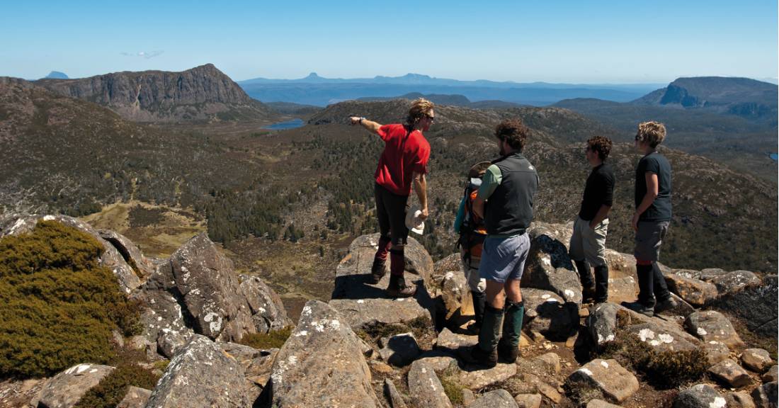 Trekkers enjoying the view with their Tasmanian Expeditions guide from the summit of Mt Jerusalem |  <i>Don Fuchs</i>