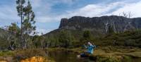 Relaxing by a stream in Walls of Jerusalem National Park. | Benny Plunkett