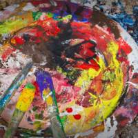 An artists palette preparing vibrant colours of the landscape