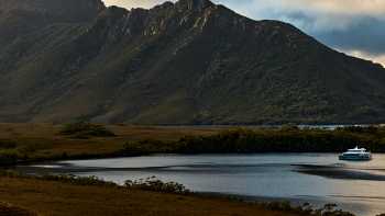 Expedition Vessel Odalisque III moored under Mt Rugby. Optional credit Tim Grey,Tim Grey Expedition Vessel Odalisque III moored under Mt Rugby