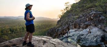 Trekker poses at a lookout | Nicholas Gouldhurst