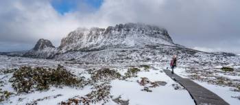 Hiker on the Overland Track in winter | Luke Tscharke